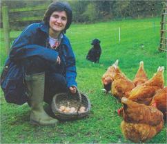 Louisa feeding the hens